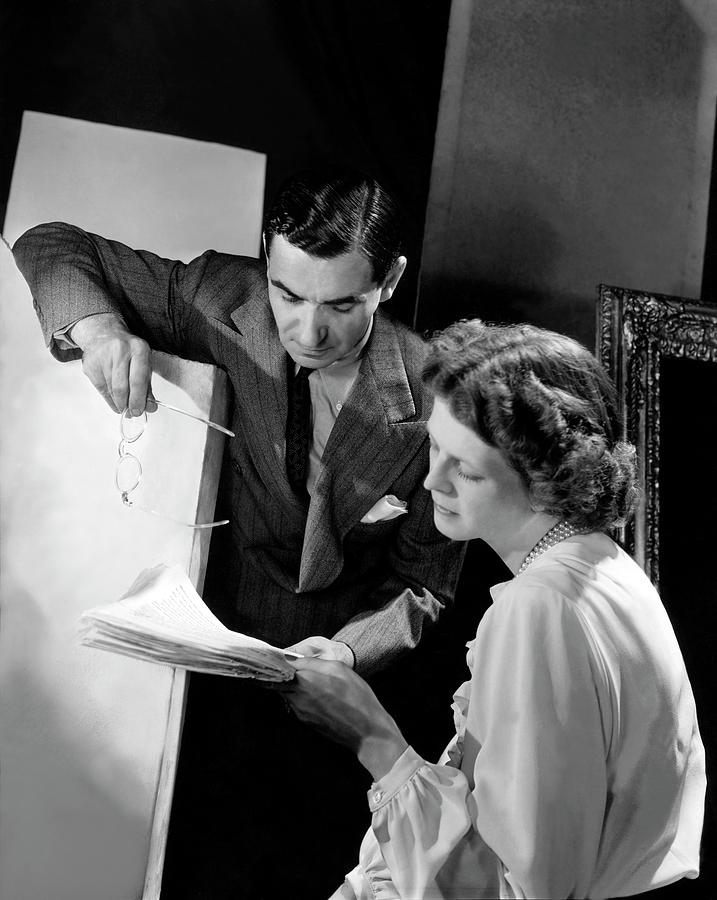 Irving Berlin Looking At Papers With His Wife Photograph by Horst P. Horst