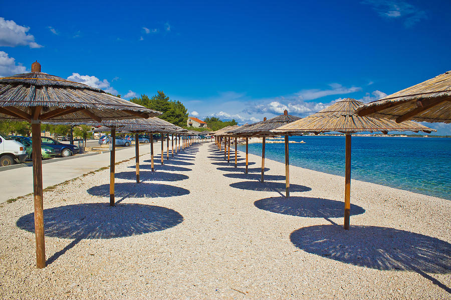Island of Vir beach umbrellas Photograph by Brch Photography