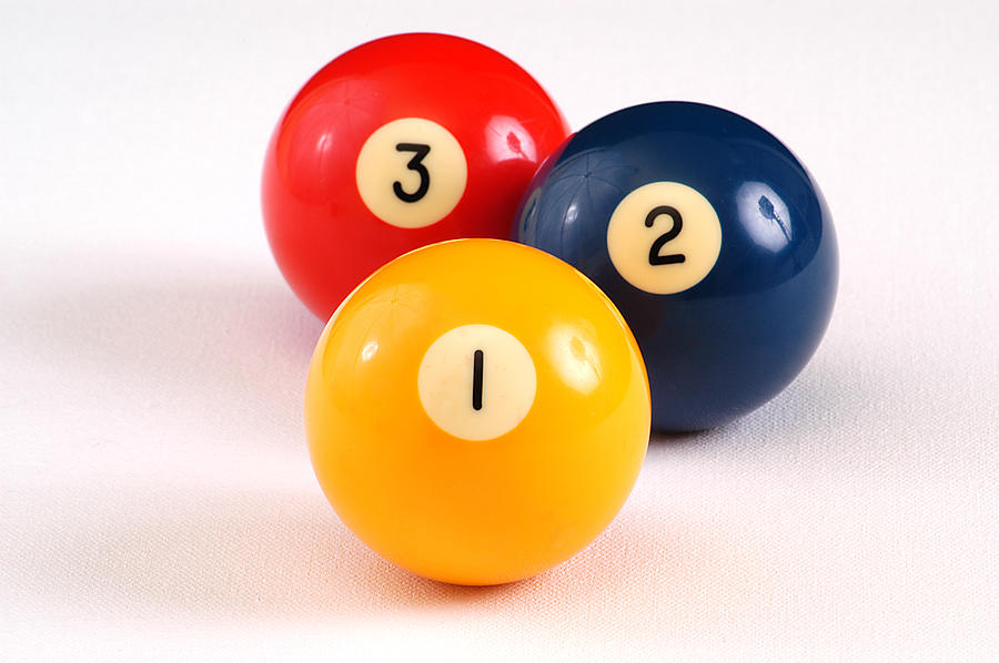 Isolated billiards balls numbered one two and three Photograph by PolenAZ