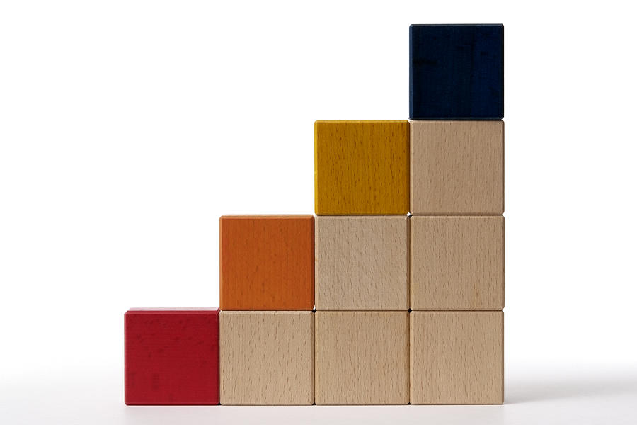 Isolated shot of bar chart from blocks on white background Photograph by Kyoshino