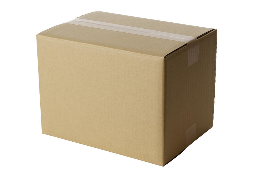 Isolated shot of closed blank cardboard box on white background Photograph by Kyoshino