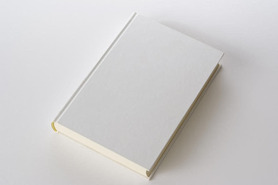 Isolated shot of white blank book on white background Photograph by Kyoshino