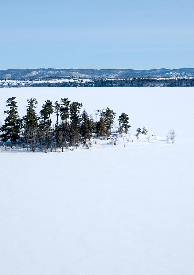 Isolation Pinheys Point in winter Ottawa River Photograph by Rob Huntley