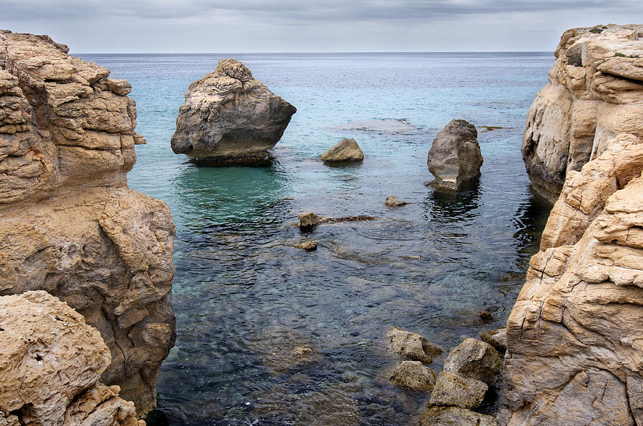 It Rocks 1 - Close to son bou beach and san tomas beach menorca scupted rocks and turquoise water Photograph by Pedro Cardona Llambias