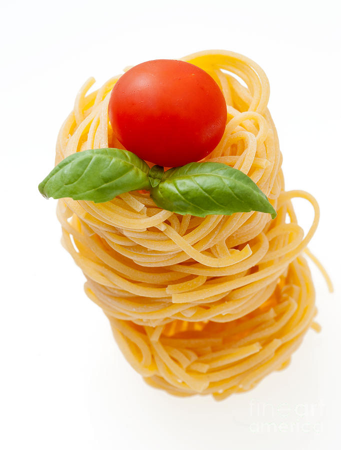Italian pasta with tomato and basil Photograph by Luciano Mortula