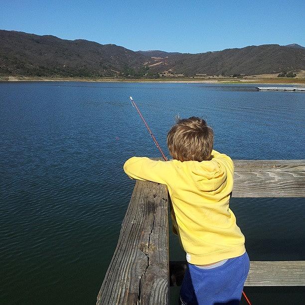 Boy Fishing Photograph - Its Called Fishing Not Catching by Brett Dewey
