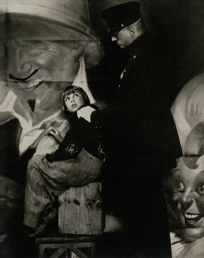 Jackie Coogan With A Policeman Photograph by Edward Steichen