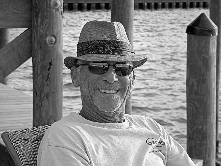 Black And White Photograph - Jackie Sitting On The Dock Of The Bay by Kathy K McClellan