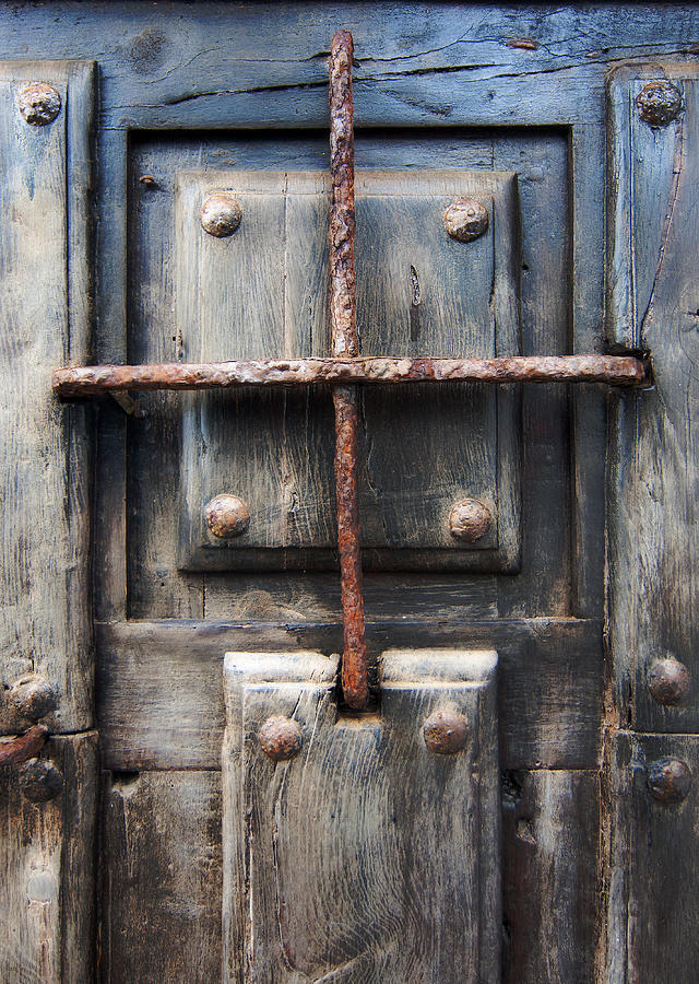 Vintage solid wood door with metal nails and metal grille - Jail of my life  Photograph by Pedro Cardona Llambias