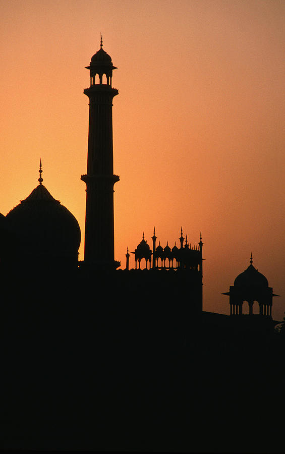 Jama Masjid dome and minaret silhouetted at sunset, Delhi, India, Indian Sub-Continent Photograph by Richard IAnson