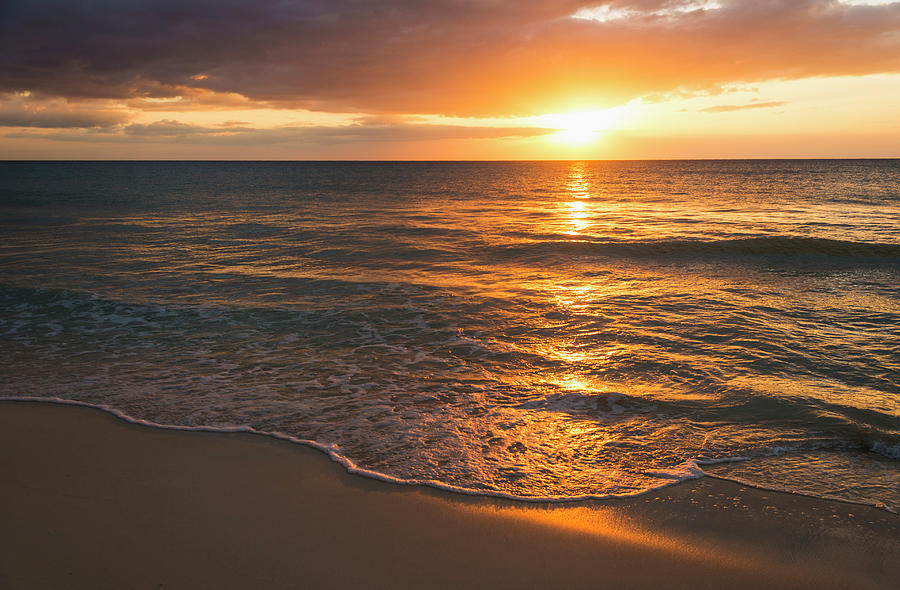 Jamaica, Sun Setting Over Sea Photograph by Tetra Images