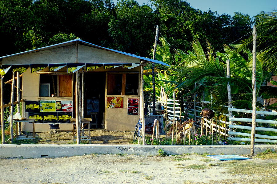 Jamaicans Party Store Photograph by Randy Pollard