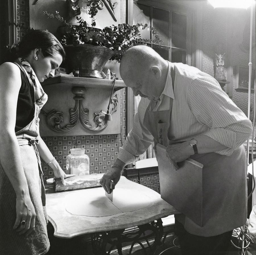 James Beard Cutting Pastry Photograph by Ernst Beadle