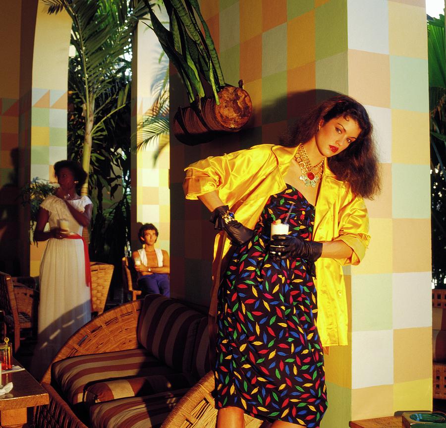 Pattern Photograph - Janice Dickinson Wearing Coat And Patterned Dress by Horst P. Horst
