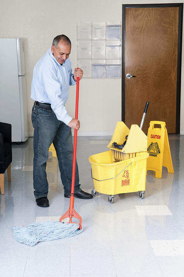 Janitorial Service - Maintenance Man Cleaning Office Floor Photograph by Leezsnow