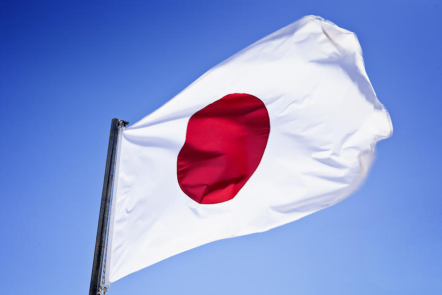 Japanese flag on pole Photograph by Mbbirdy