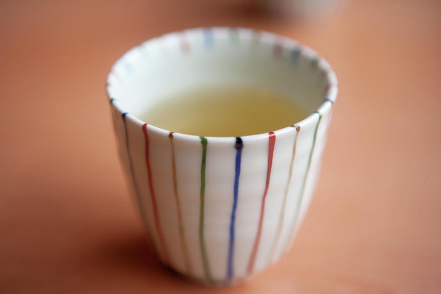 Japanese Tea Cup Of Green Tea Photograph by Liesel Bockl