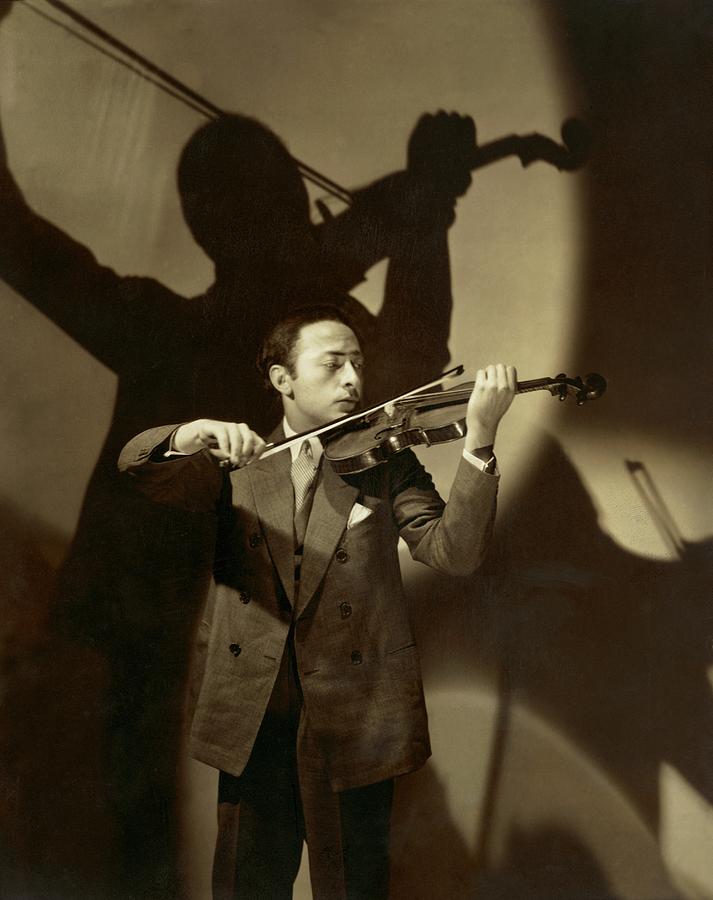 Jascha Heifetz Playing His Violin Photograph by Edward Steichen