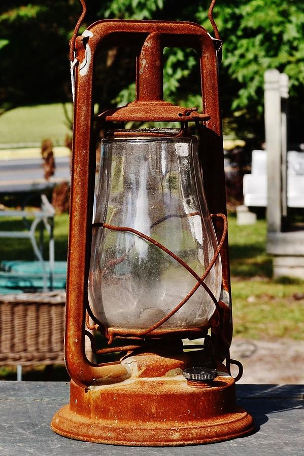 Hurricane Lantern at Jaynes Reliable Antiques and Vintage Photograph by Kim Bemis