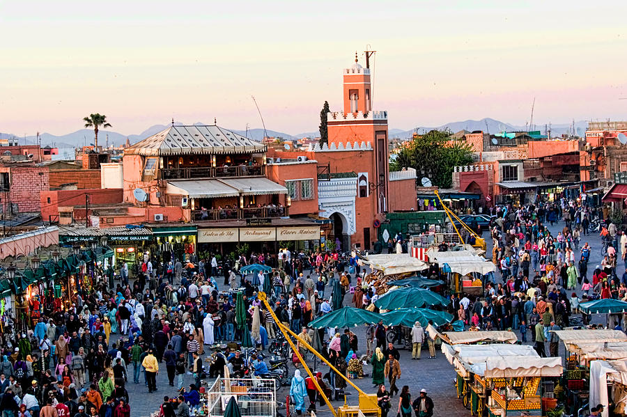 Jemaa el Fna square at Dusk in Marrakesh Morroco Photograph by David Smith