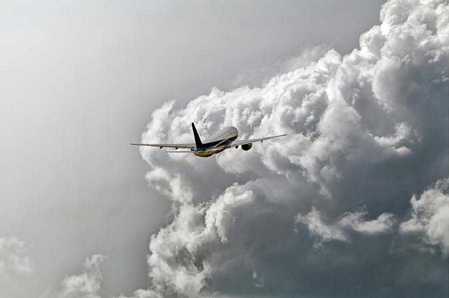 Jet Flying Into The Storm Photograph by José Rentería Cobos Photography