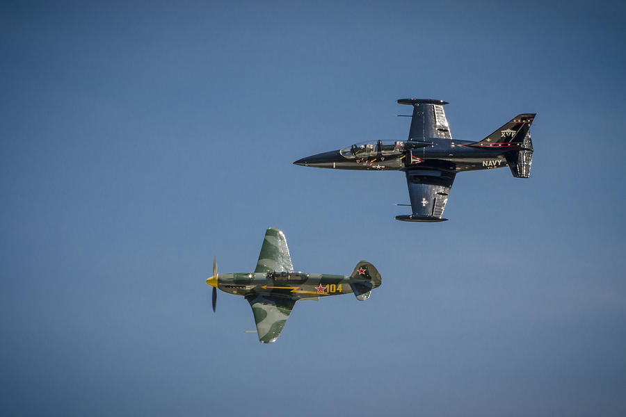 Jet vs Plane Photograph by Bradley Clay