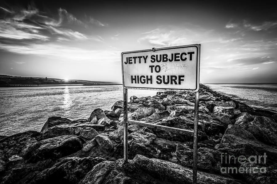 Jetty Subject to High Surf Sign Black and White Picture Photograph by Paul Velgos