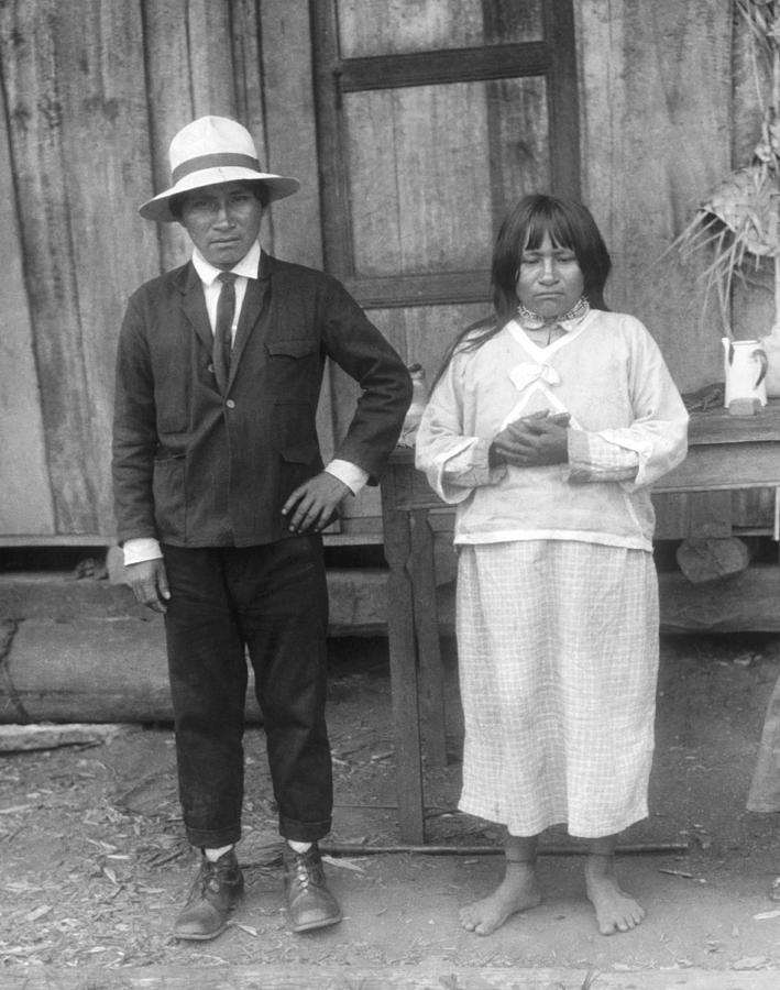 Vintage Photograph - Jivaro Headhunter And HIs Wife by Underwood Archives
