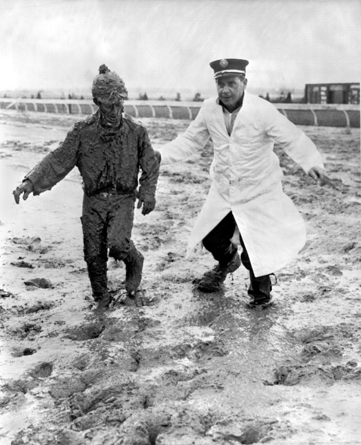 Jockey Rescued From The Mud Photograph by Underwood Archives