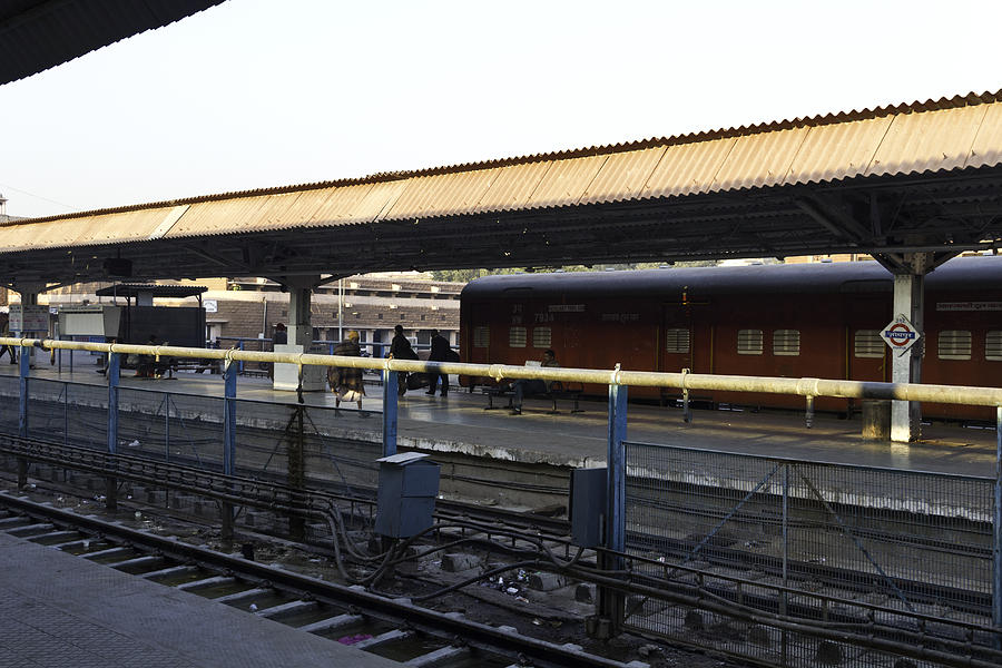 Jodhpur train station along with train track and passengers and train Photograph by Ashish Agarwal