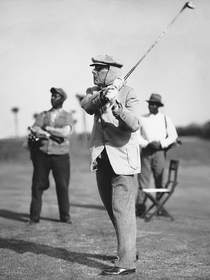 John D. Rockefeller playing golf. - NYPL Digital Collections