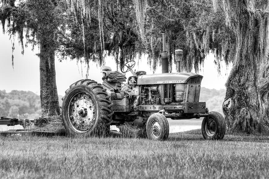 John Deer Tractor Under the Old Cedar Photograph by Scott Hansen