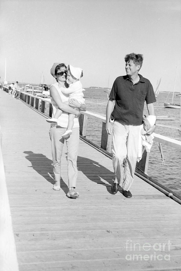 John F. Kennedy and Jacqueline Kennedy at Hyannis Port marina Photograph by The Harrington Collection