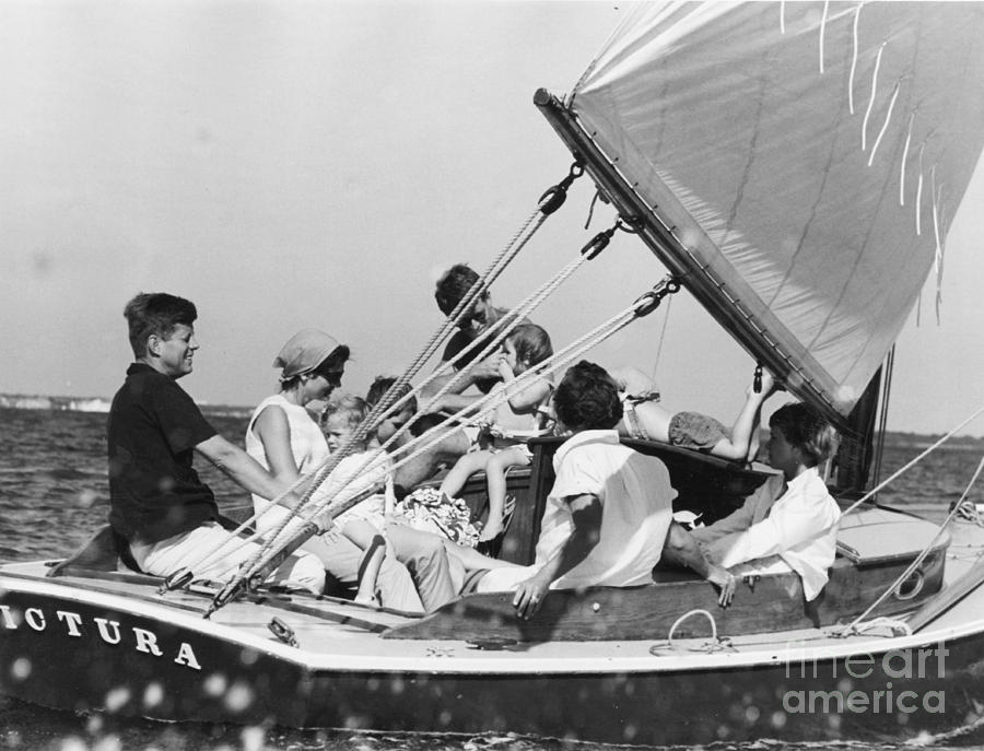 Senator John F. Kennedy Photograph - John Kennedy with Robert and Jacqueline Sailing by The Harrington Collection