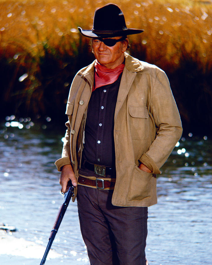 John Wayne Photograph - John Wayne in Rooster Cogburn  by Silver Screen