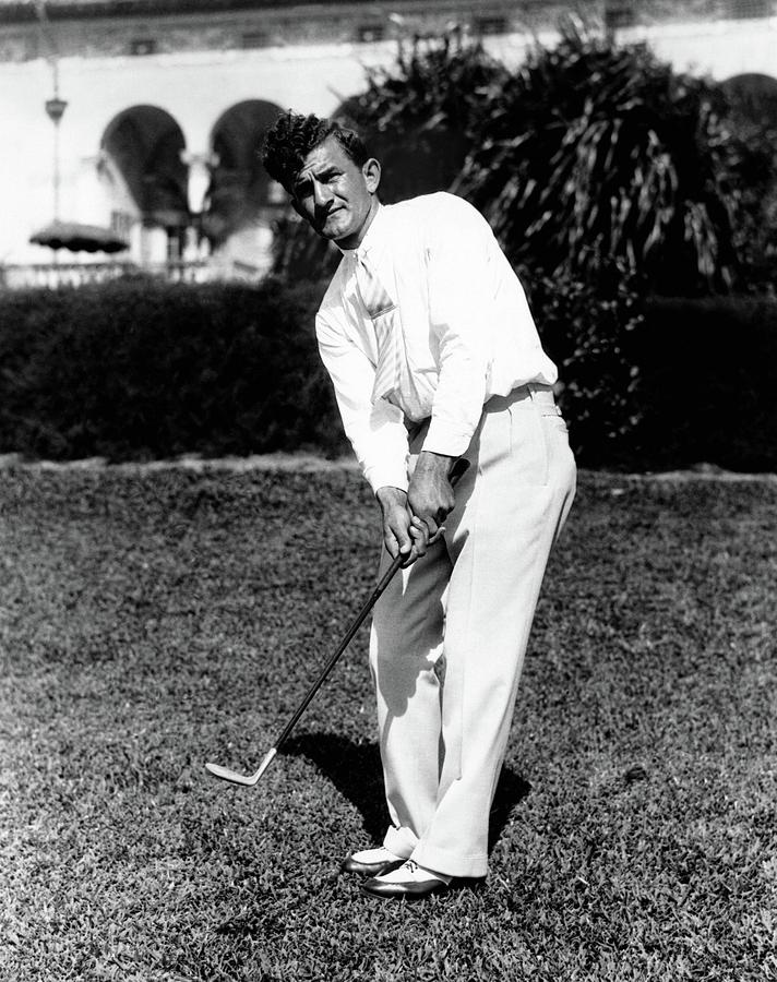 Johnny Revolta Playing Golf Photograph by Acme