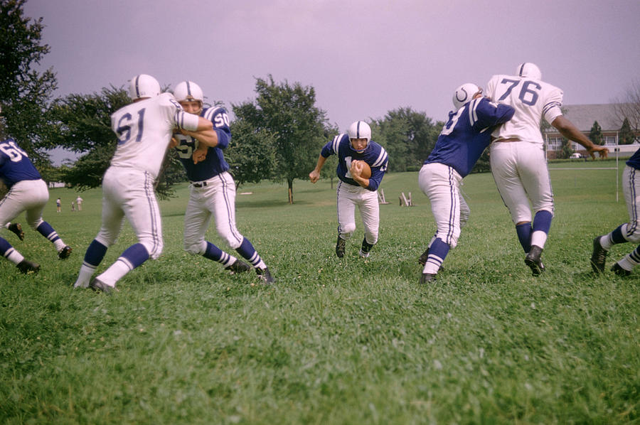 Johnny Unitas Photograph - Johnny Unitas Running Up The Middle by Retro Images Archive