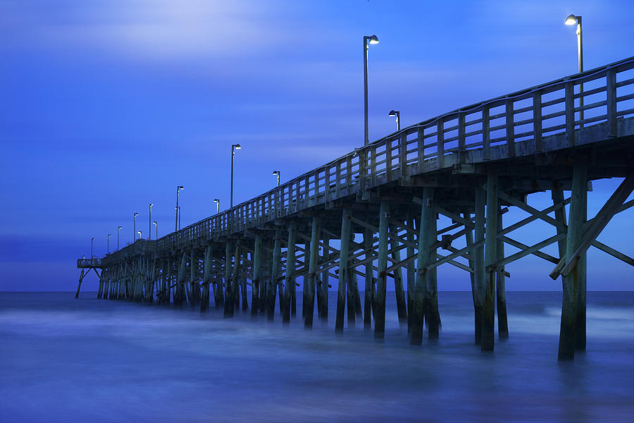 Jolly Roger Pier after Sunset Photograph by Mike McGlothlen