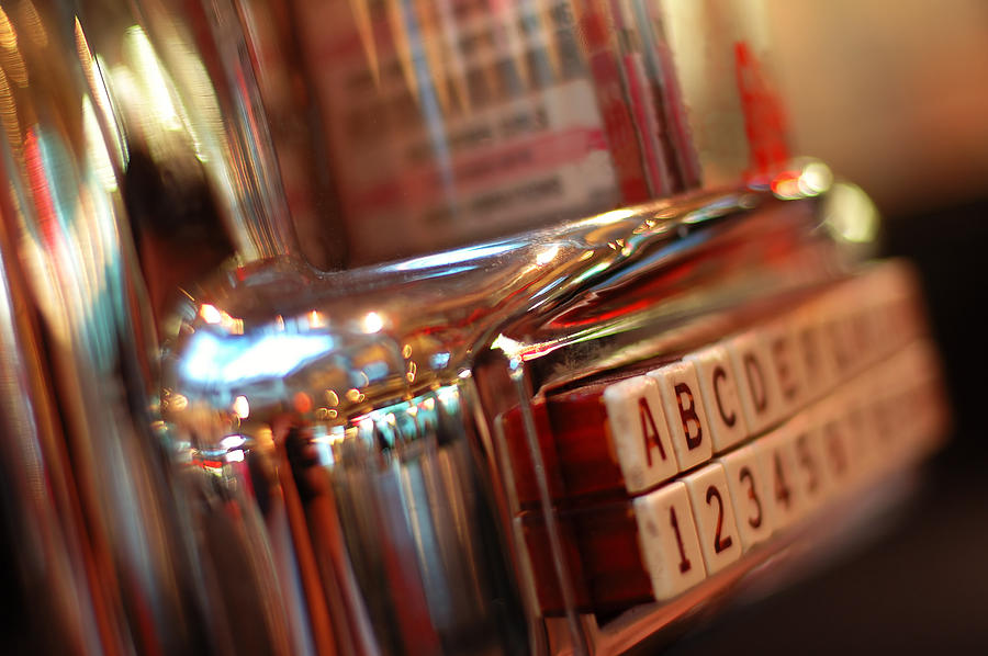 Jukebox on a blurred picture, vintage style Photograph by Naphtalina
