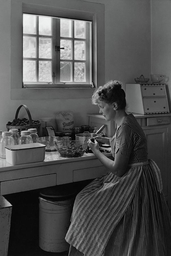 June Plat Preparing Food In Her Kitchen Photograph by Samuel H. Gottscho