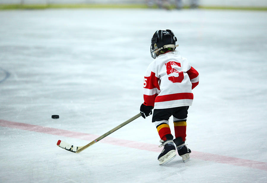 Junior ice hockey. Photograph by Gilaxia