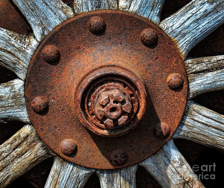 Junk Yard Wheel Hub and Wooden Spokes Photograph by Henry Kowalski