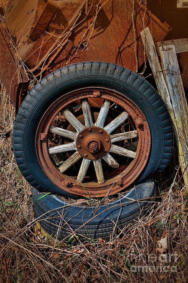 Junkyard Flat Tire Photograph by Henry Kowalski
