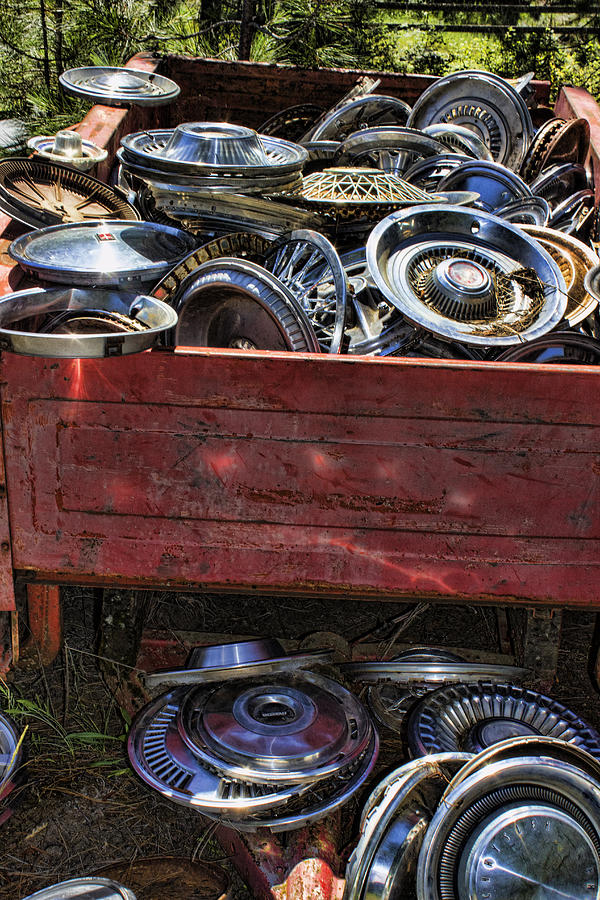 Junkyard Series Wagon full of Hubcaps Photograph by Cathy Anderson
