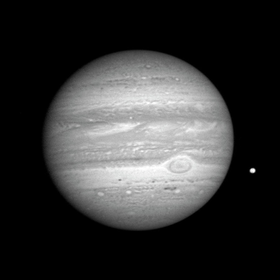 Jupiter And Its Moon Io Photograph by Jhuapl/swri/nasa/science Photo Library