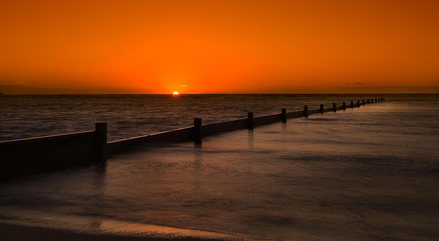 Sunset Photograph - Kahala seawall sunrise by Tin Lung Chao