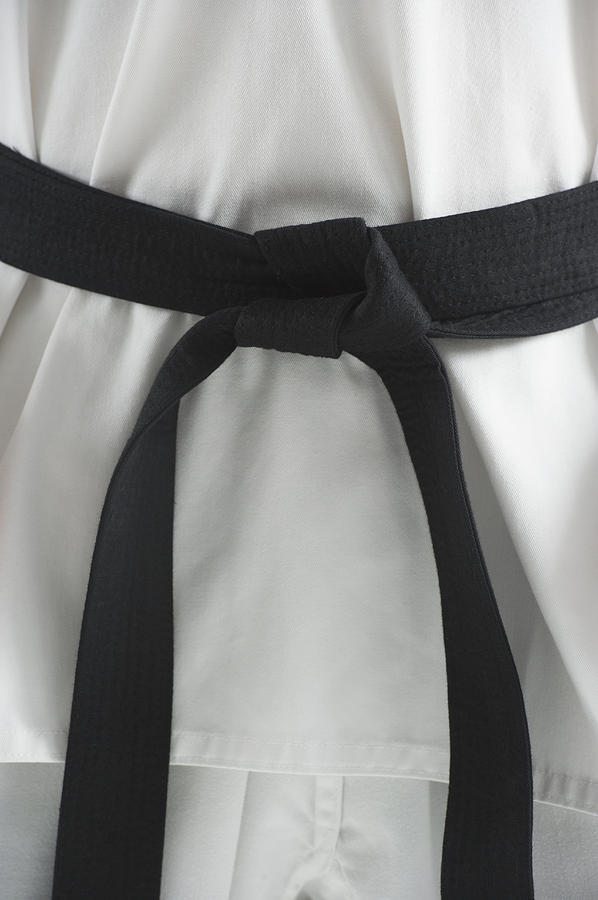 Karate black belt Photograph by Tetra Images