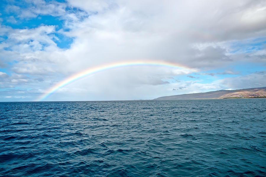 Kauai Island shore and the rainbow Photograph by Marek Poplawski