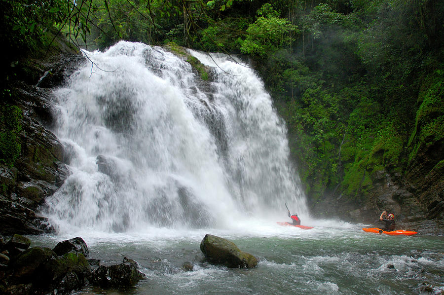 Jungle Photograph - Kayakers Look Back At An Amazing by Lucas Gilman