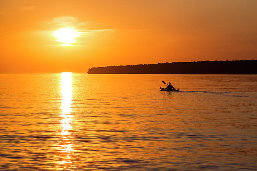 Apostle Islands National Lakeshore Photograph - Kayaking At Sunset In The Apostle by Chuck Haney